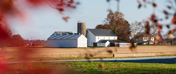 image of a remote barn and house